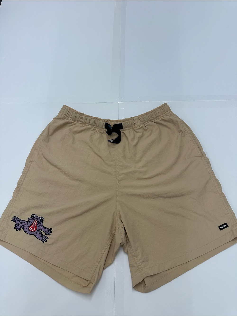 Obey Men's Beige Athletic Shorts with Black Drawstring and Frog Patch